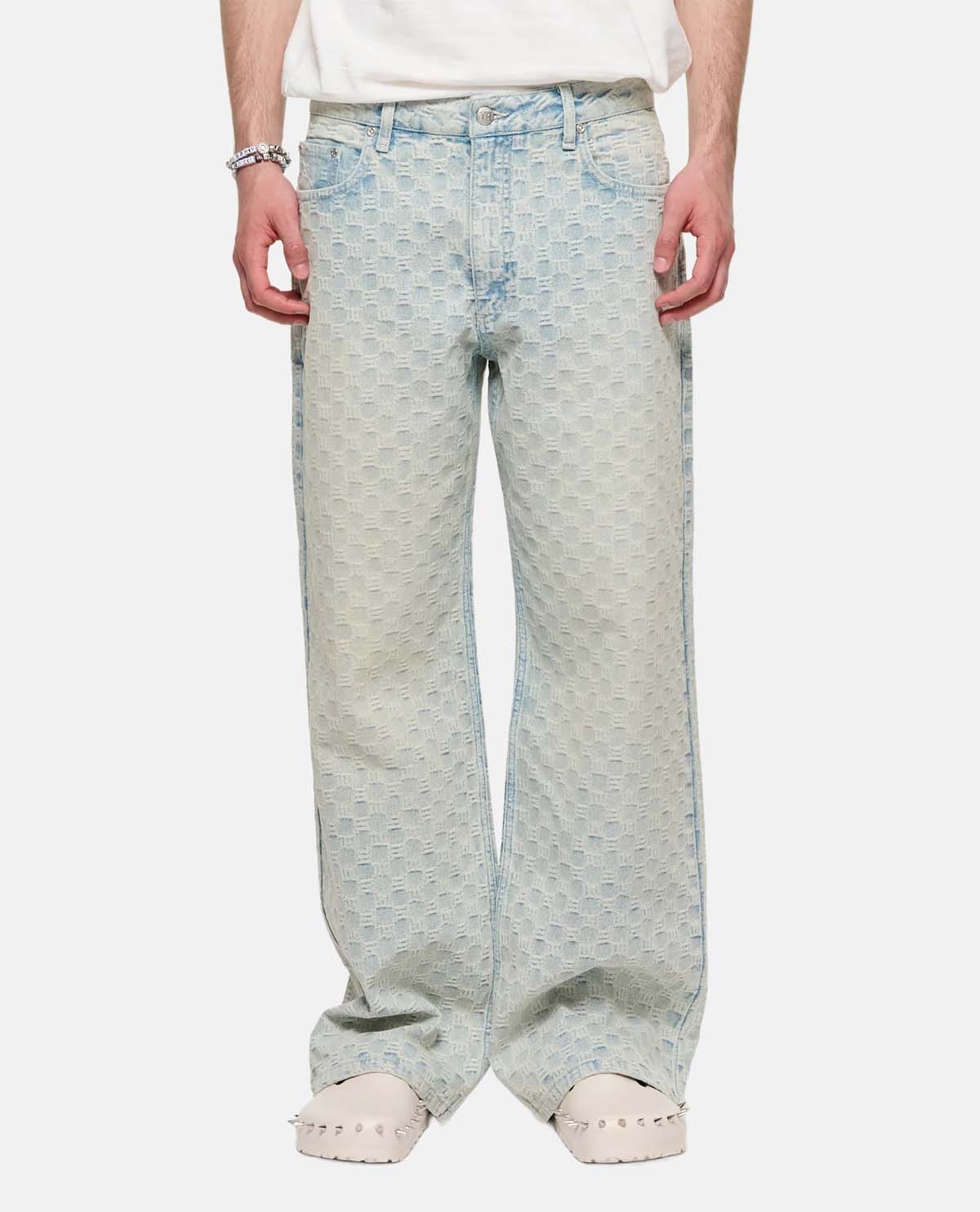 Quần jeans họa tiết monogram