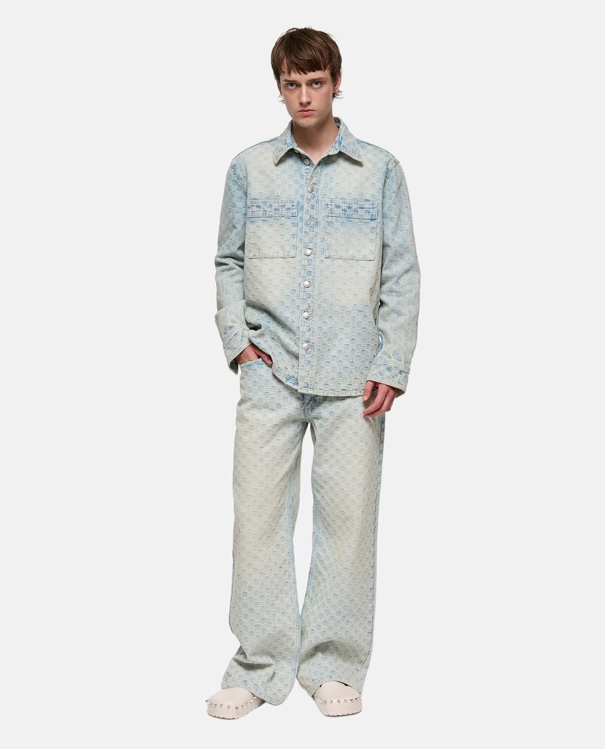 Quần jeans họa tiết monogram