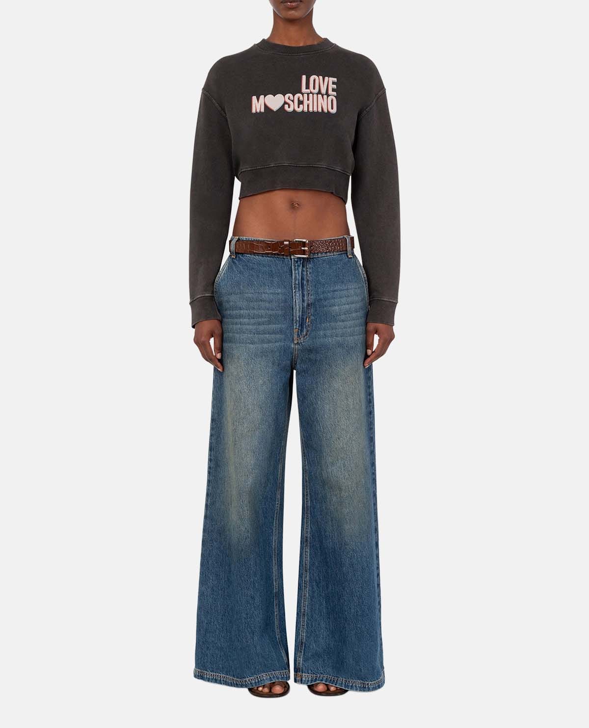 Quần jeans ống rộng phối logo